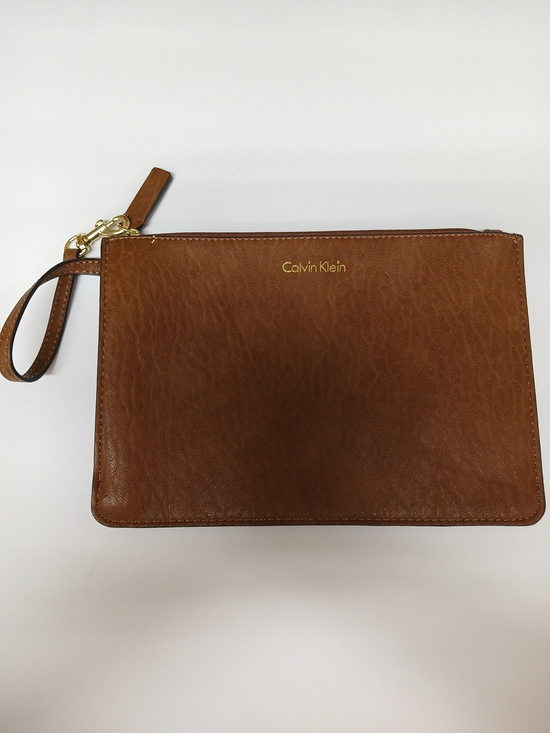 Calvin Klein Handbags - ❗️NWOT Calvin Klein Cognac Leather Wristlet Pouch